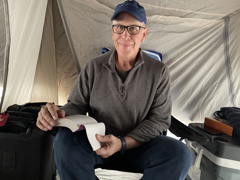 John in tent